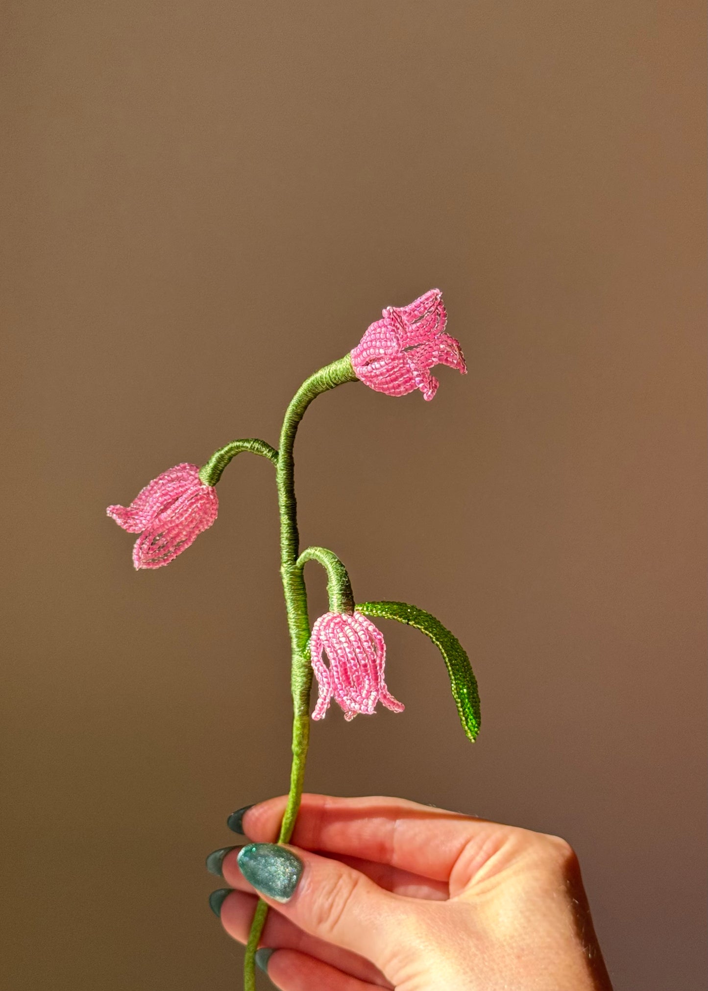 single lily of the valley stem