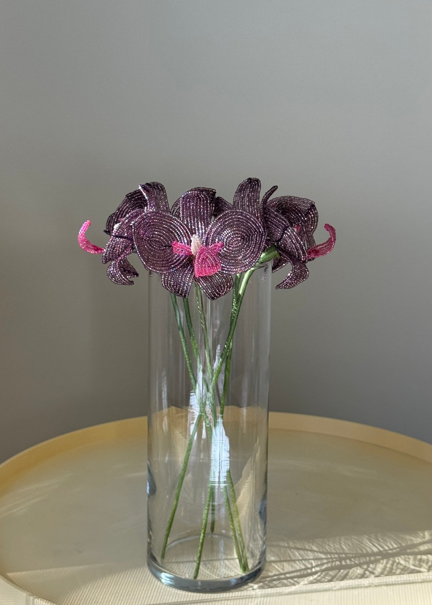 single purple orchid stem