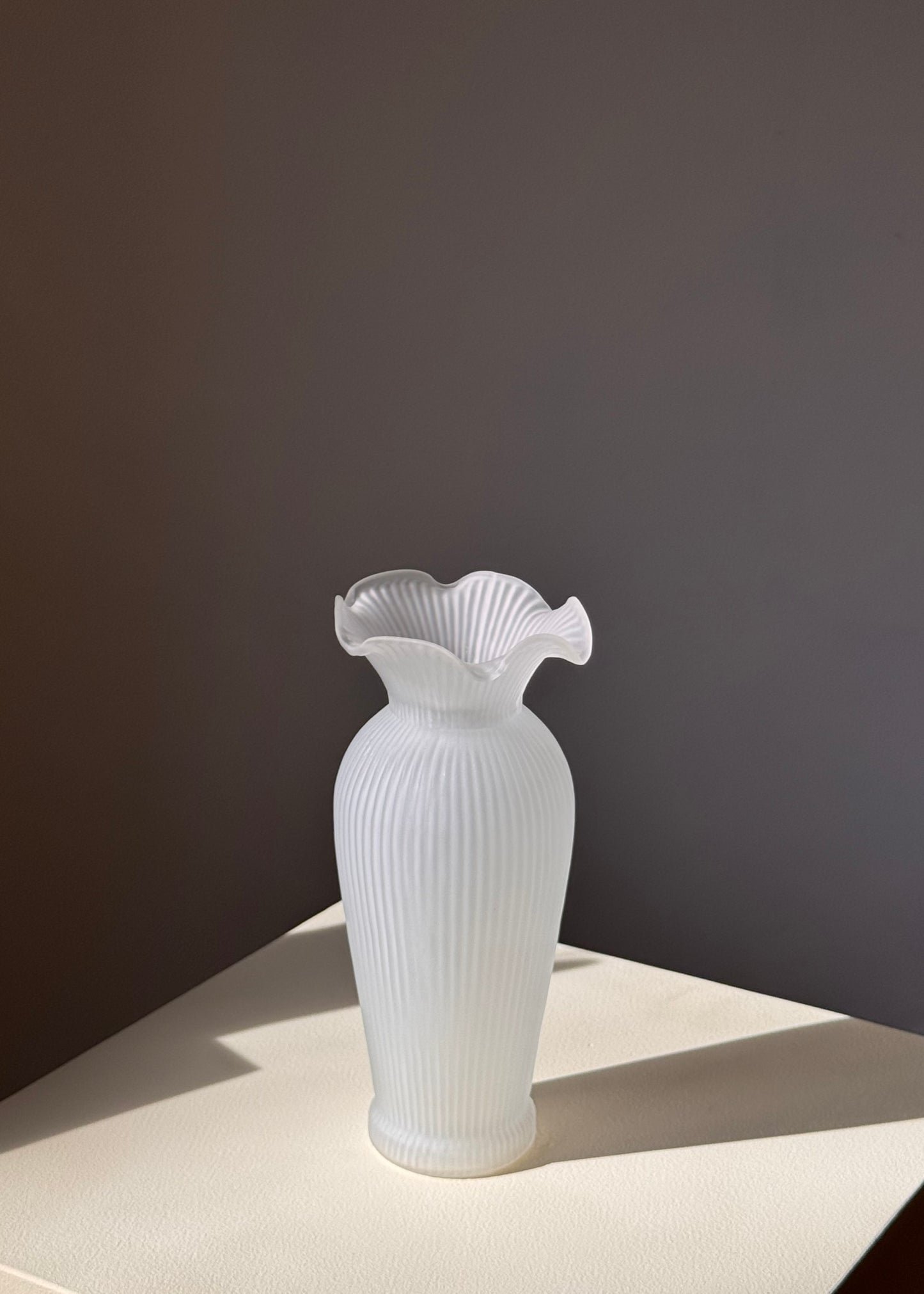 frilly white vase