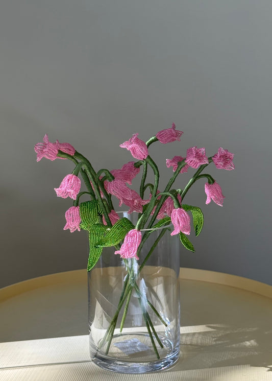single lily of the valley stem