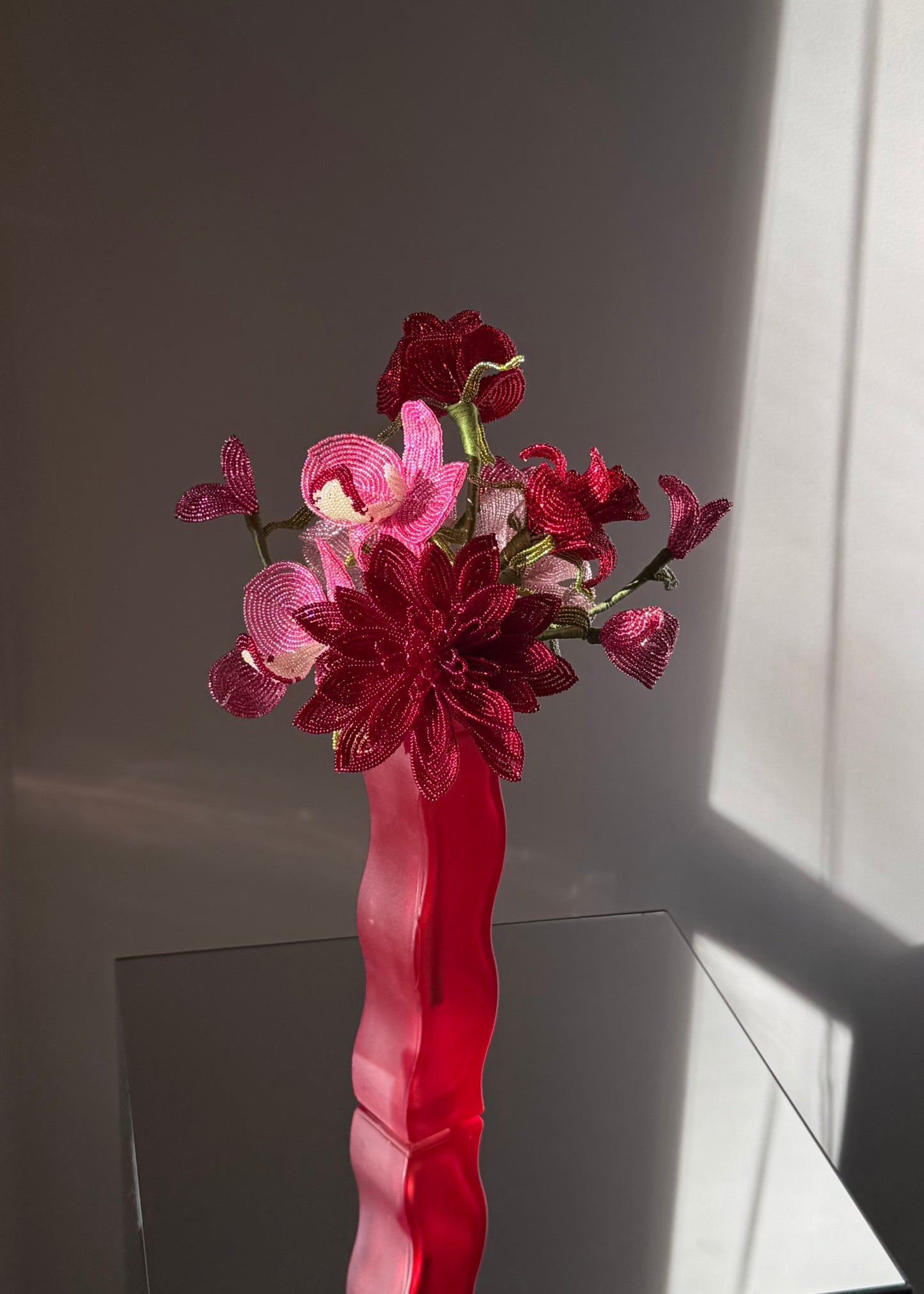 red squiggle vase