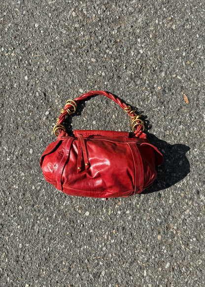 rough roses burnt orange bag